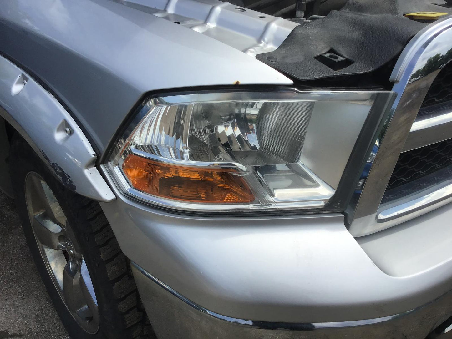 Phare halogène droit d'occasion OEM pour RAM 1500 2009-2012 55277410AF