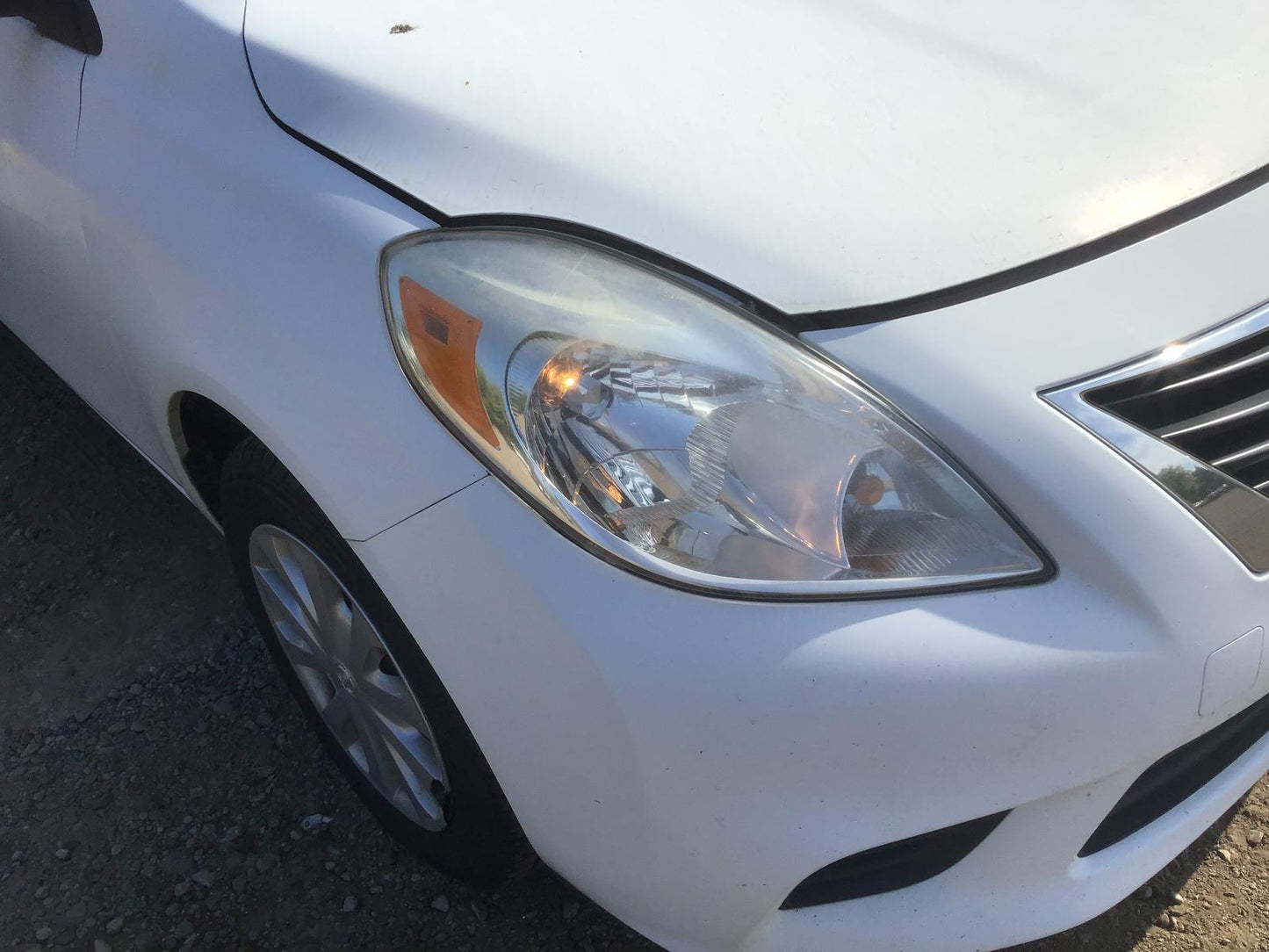 Phare halogène droit d'occasion OEM pour berline Versa 2012-2014 (260103AN0B)