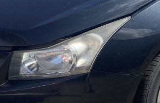 Phare halogène côté conducteur d'occasion pour Chevrolet Cruze 95291963