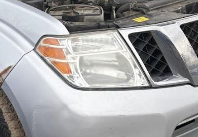 Used OEM RH Headlight fits 2008-2012 Nissan Pathfinder 26010ZS00A