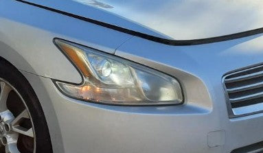 Used OEM RH Passenger side (HID) Headlight fits 2009-2014 Nissan Maxima