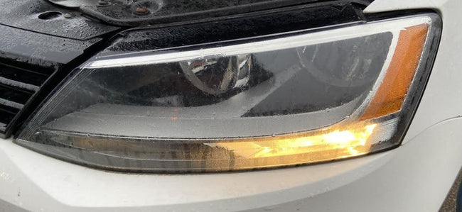 Phare halogène côté conducteur d'occasion pour Volkswagen Jetta 5C7941005 2011-2016