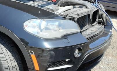Used OEM RH Passenger Side Headlight w/adaptive light control fits 2012-2013 BMW X5 63127298452