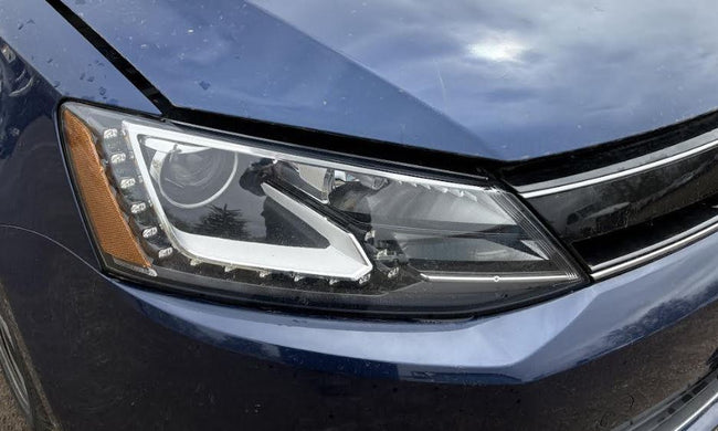 Used OEM RH Passenger side HID Headlight fits 2012-2014 Volkswagen Jetta, Jetta GLI Sedan 5C7941752D