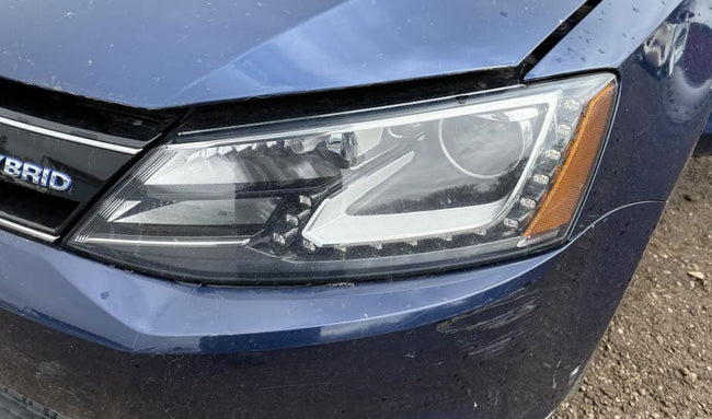 Used OEM LH Driver side HID Headlight fits 2012-2014 Volkswagen Jetta, Jetta GLI Sedan