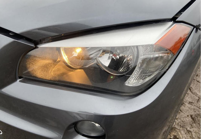 Phare halogène côté conducteur d'occasion pour BMW X1 2013-2015 (référence 63117290237)