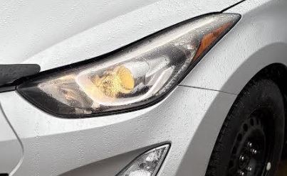 Phare projecteur côté conducteur d'origine d'occasion, compatible avec Hyundai Elantra berline 2014-2016 et coupé 2014-2015, référence 921013Y510 (fabrication américaine) et 921013X450 (fabrication coréenne).